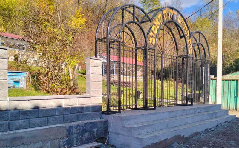Fencing work at the Jewish cemetery in Kosiv, Ukraine, is ongoing